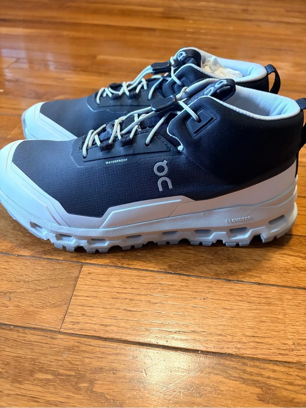 On Running Youth 4.5 Cloudhero mid waterproof Trail Shoes in Black and White